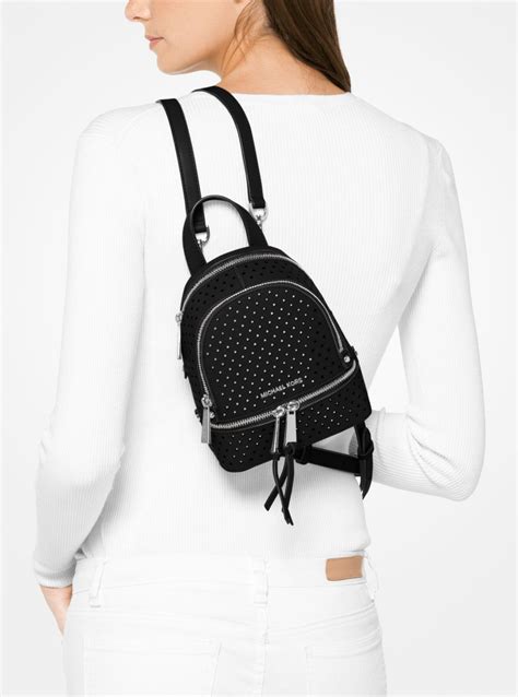 michael kors rhea mini perforated backpack|mk rhea slim backpack.